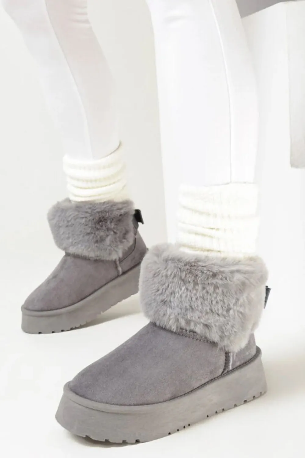 GLORIA SLIP ON ANKLE BOOTS WITH FAUX FUR AND BOW DETAIL IN GREY SUEDE