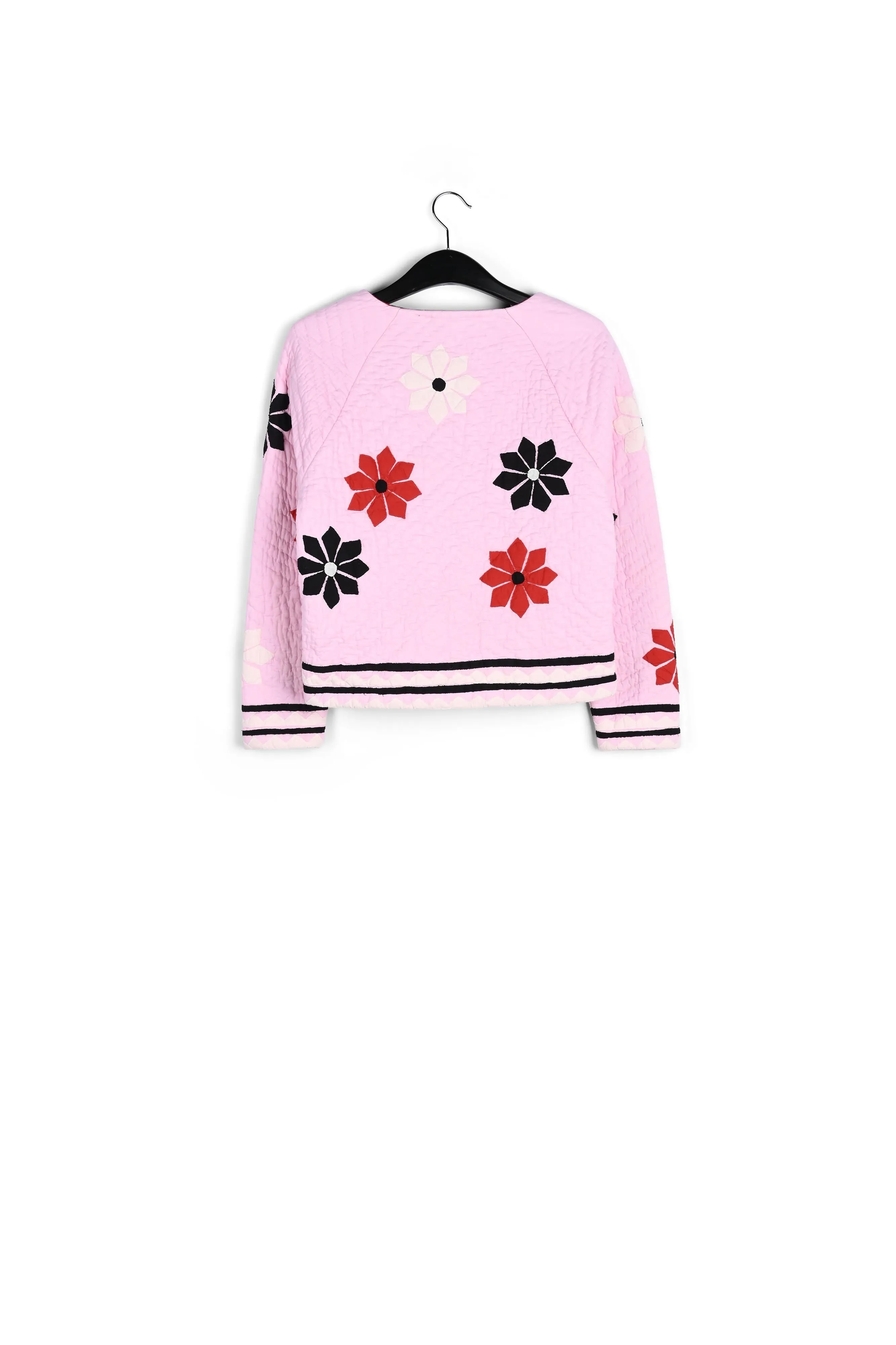 Light pink quilted jacket with flower patches